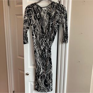 Stretchy black and white midi wrap dress abstract pattern